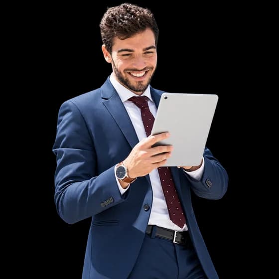 Smiling businessman holding a tablet